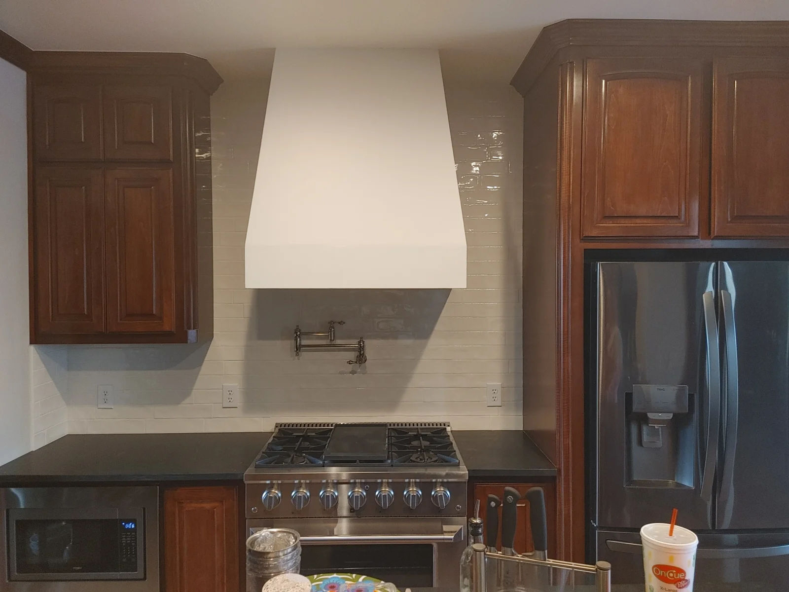Kitchen Remodel with Custom Cabinetry and Range Hood